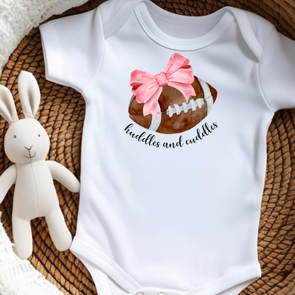 Huddles and Cuddles Football with Pink Bow Infant Bodysuit